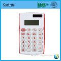 solar pocket calculator in white and red